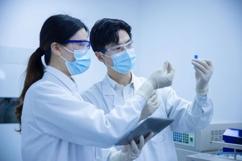 Female and male scientists working in a laboratory